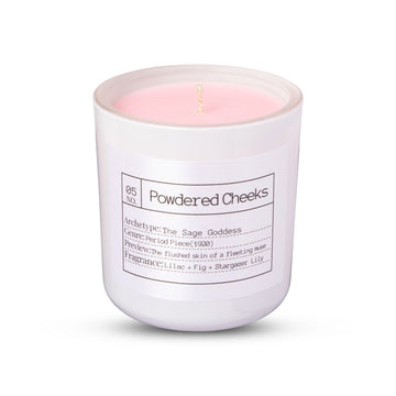 Candle in a white container labeled 'Powdered Cheeks' on a white background FLORES LANE MOVIE GENRE SCENTED CANDLE: PERIOD MOVIE | ACADEMY MUSEUM